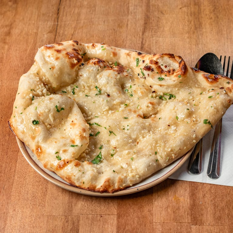 Naan: A Must-Try at Our Indian Restaurant